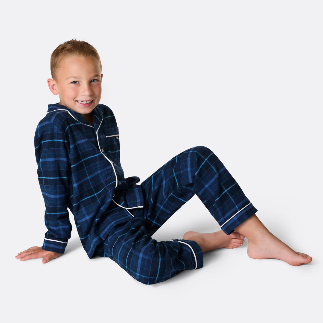 Sininen flanellinen joulupyjama lapsille