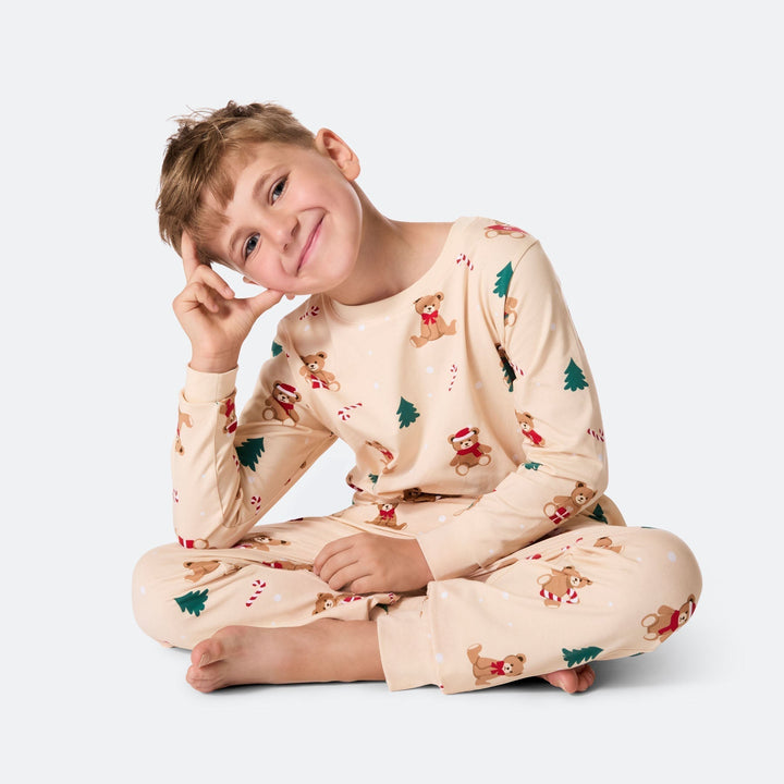 Beige nalle-joulupyjama lapsille